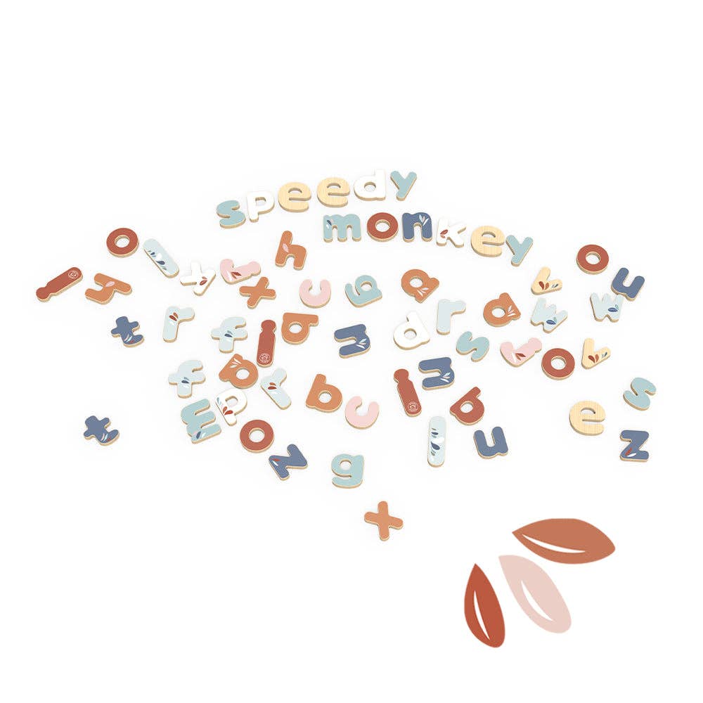 Speedy Monkey - Magnetic Letters 60 pcs in soft pastel colors scattered on white background, featuring playful and educational design for imaginative learning in a curated children’s boutique.
