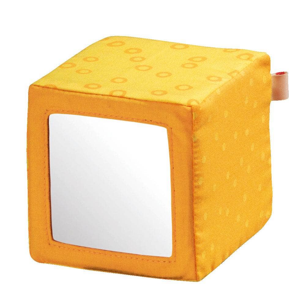 Happy Quartett Baby's 4 Piece Soft Block Set featuring a yellow soft fabric cube with a mirror on one side, designed for sensory play and safe tactile exploration.