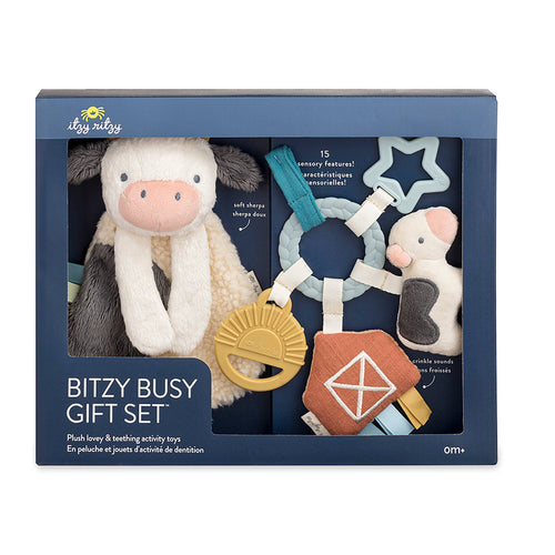 Itzy Ritzy - Bitzy Busy Gift Set™ featuring plush lovey and teething activity toys in soft neutral colors, designed for soothing sensory play and baby comfort.