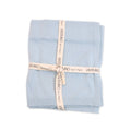 Viverano Organics - Milan Pastel Baby Blanket Sweater Knit (Organic Cotton): Sky Blue folded and tied with branded ribbon, showcasing a soft, breathable organic cotton fabric, perfect for cozy baby essentials.