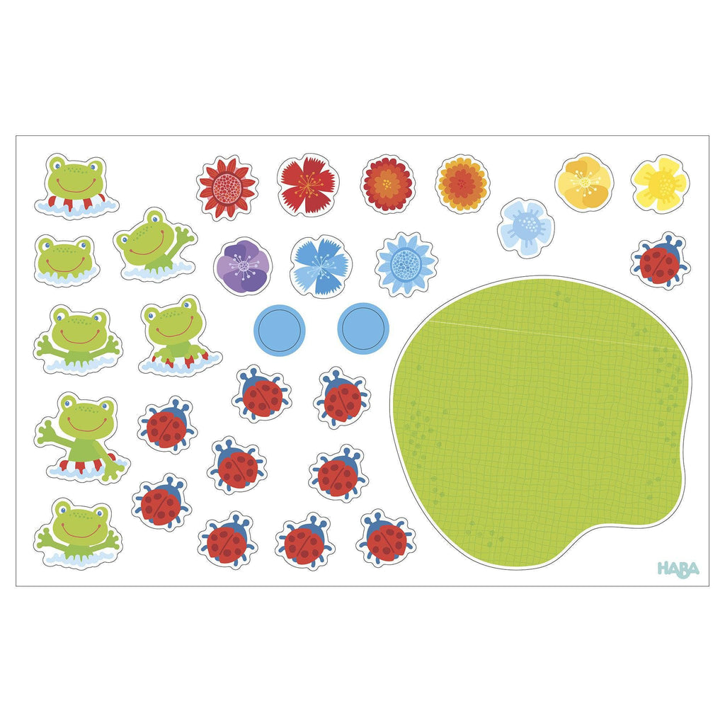 1, 2 Numbers & You Magnetic 158 Piece Game Box with colorful magnetic pieces featuring frogs, ladybugs, flowers, and a green lily pad for fun, educational play and imaginative learning.