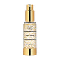 Merle Norman Cosmetics - 24K Gold Firming Foundation Primer in a clear pump bottle with gold flakes and shiny gold cap, designed for a luxurious skincare routine.