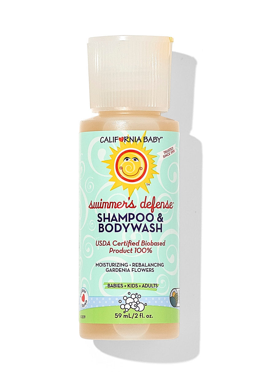 Small bottle of California Baby - Swimmer's Defense™ Shampoo & Bodywash with moisturizing gardenia scent, suitable for babies, kids, and adults in soft pastel packaging.