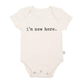 Finn + Emma - Baby graphic organic bodysuit | i'm new here in soft neutral color, featuring breathable organic fabric and simple black text, perfect for cozy baby essentials.
