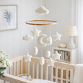 Mobile - Felt Baby - Moon & Stars hanging nursery mobile with soft white felt stars, clouds, crescent moon, and shapes, designed for a cozy baby nursery ambiance.