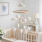 Mobile - Felt Baby - Moon & Stars hanging nursery mobile with soft white felt stars, clouds, crescent moon, and shapes, designed for a cozy baby nursery ambiance.