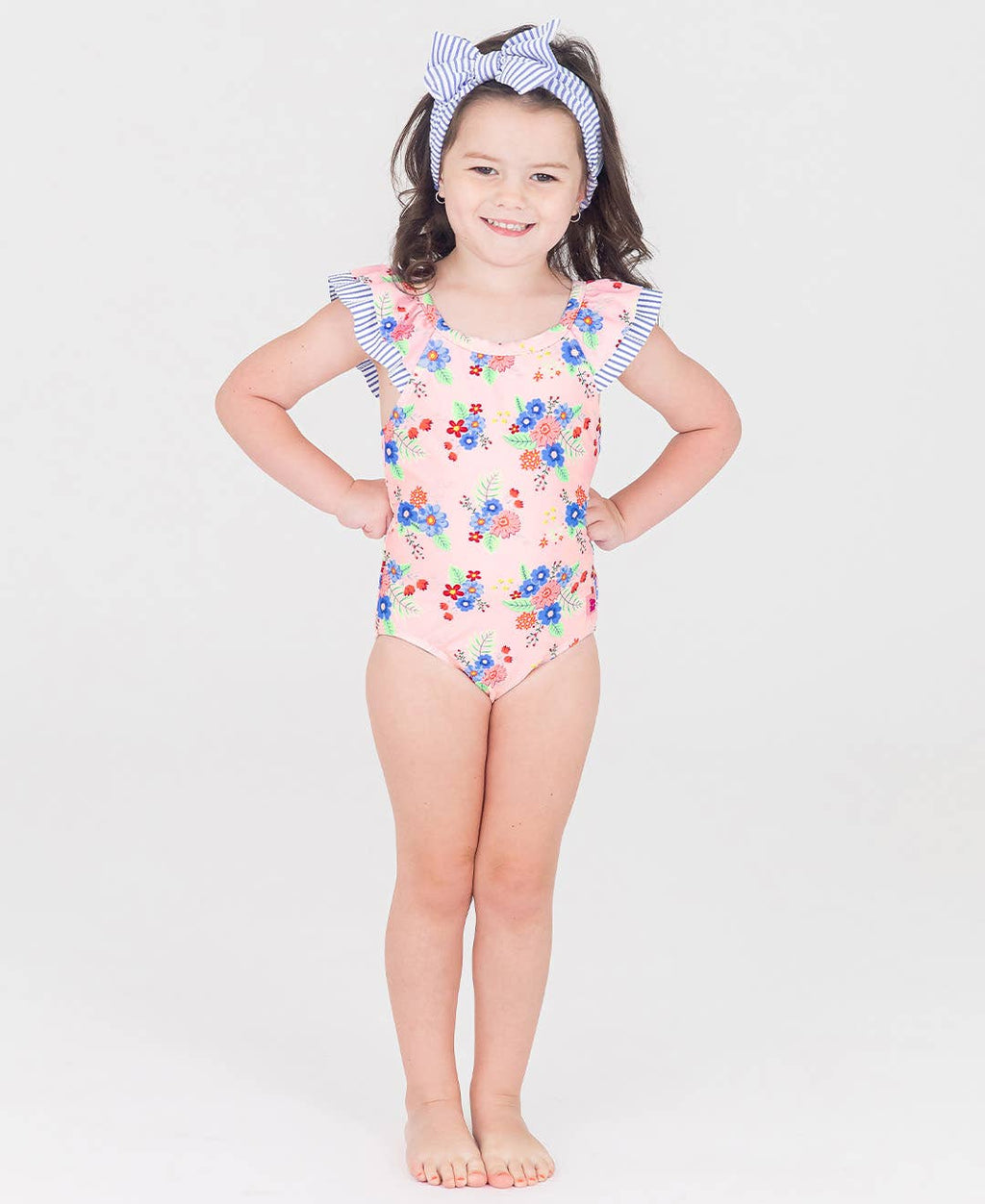 RuffleButts + RuggedButts - Girls Coastal Breeze Floral Bow V-Back One Piece Swimsuit: Pink / 18-24m