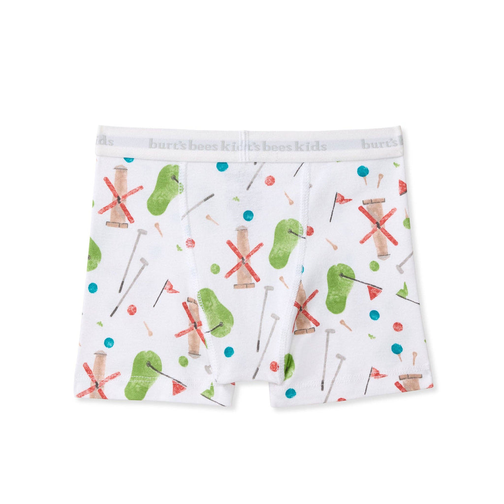 White boyshort underwear for kids with a colorful golf-themed print featuring green tees, red X's, flags, and golf clubs.