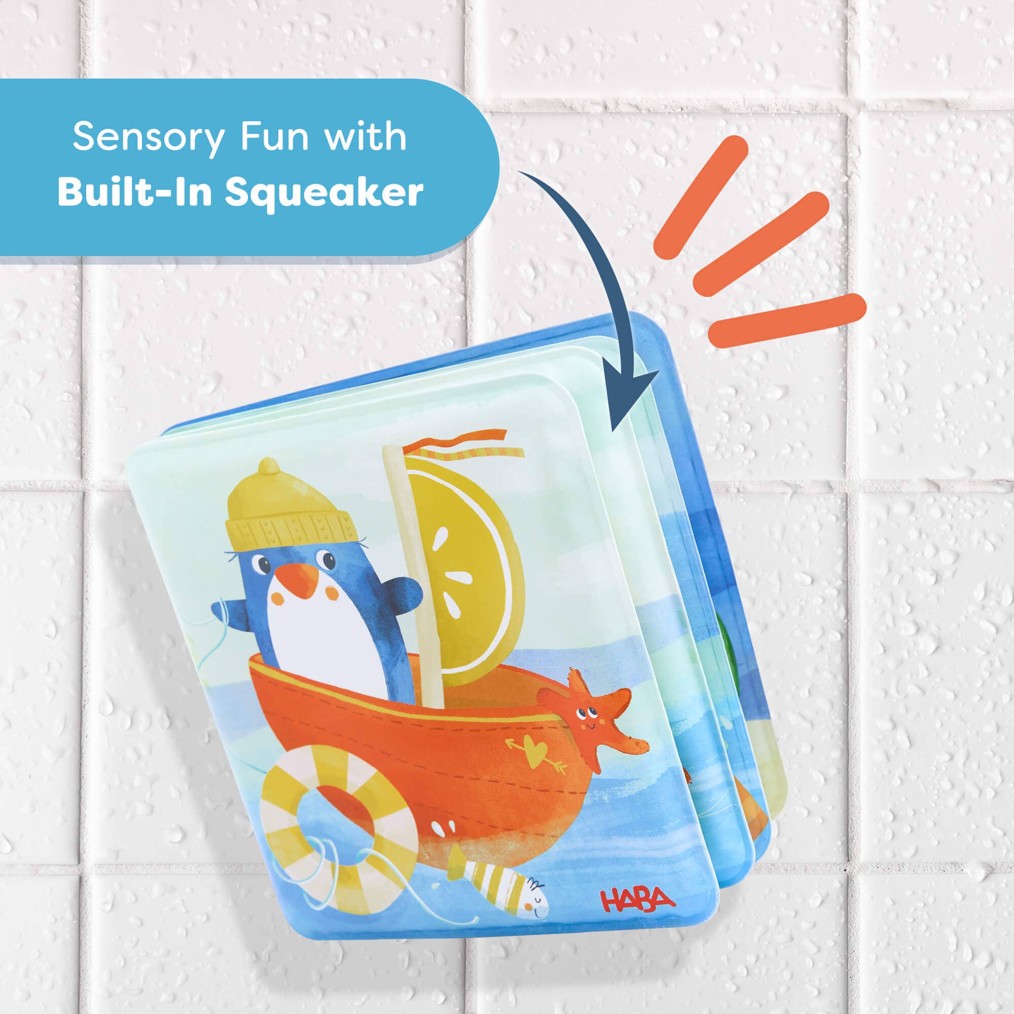 Penguin Bath Book with Squeaker featuring a colorful penguin in a boat illustration, designed for sensory fun during bath time with a built-in squeaker, perfect for babies and toddlers.