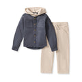 Children's outfit with dark blue shirt and beige pants on a white background