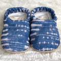 Soft fabric baby shoes in light blue and white with a tie-dye pattern, designed for comfort and style, CLAMFEET - JUSTIN (Lt. Baby Blue/White) from a curated children’s boutique.