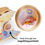 Underwater World Wooden Shape Sorter featuring a child-friendly magnifying porthole showcasing colorful underwater sea creatures for imaginative play and educational fun.