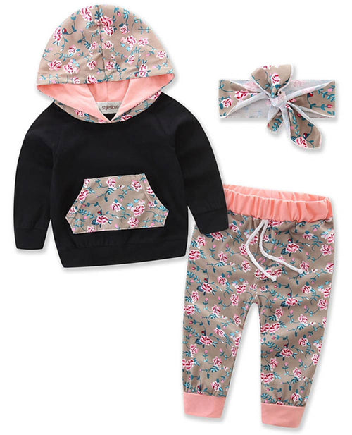 Fennco Styles - Black-Pink Baby Hoodie, Pants & Headband featuring a black hoodie with floral accents, matching floral pants with pink cuffs, and a coordinating floral headband, stylish kids clothing for cozy baby essentials.