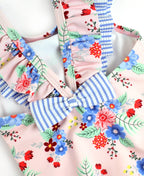 RuffleButts + RuggedButts - Girls Coastal Breeze Floral Bow V-Back One Piece Swimsuit: Pink / 18-24m