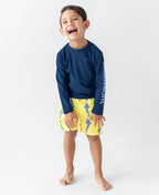 RuffleButts + RuggedButts - Boys Jawsome Swim Trunks
: 12-18m