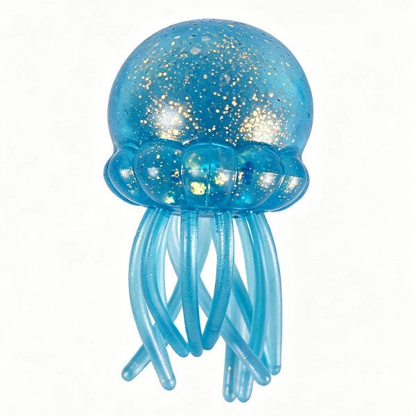 Blue jellyfish-shaped toy with glowing interior on a white background