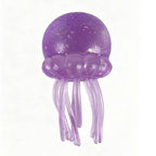 Purple jellyfish-shaped toy on a white background