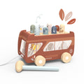 Speedy Monkey - Bus Pounding Bench is a charming wooden toy bus with colorful animal pegs to hammer, designed for imaginative play and developing motor skills.