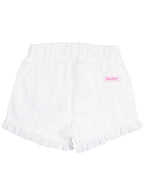 RuffleButts + RuggedButts - Toddler Girls White Ruffle Trim Woven Shorts: White soft white toddler shorts with ruffle trim edges and elastic waistband, perfect for stylish kids clothing in a curated children’s boutique.