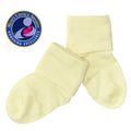 Soft cream-colored baby socks with folded cuffs, designed for comfort and durability, showcased alongside a Mom’s Choice Awards emblem, featuring babysoy Inc - Babysoy Modern Stay on Socks: Soy.