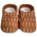 Soft baby shoes in warm light and dark caramel tones, designed for comfort and style, featuring breathable fabrics and a cozy fit, perfect from the CLAMFEET - CALEB (Lt. & Dark Carmel) collection.