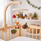 Mobile - Felt Baby - Forest Friends baby mobile with felt woodland animals and nature elements hanging over a crib, soft neutral colors in a cozy nursery setting.