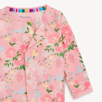 A pink long-sleeve baby pajamas with a colorful floral print, featuring a striped collar trim.