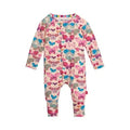 A baby long-sleeve footless one-piece jumpsuit with an all-over colorful butterfly print on a light pink background, shown against a plain white background.