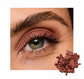 Close-up of an eye with warm mauve eyeshadow applied, next to crushed eyeshadow powder, showcasing Soft Touch Shadow (Limited-Edition Discontinued).