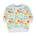 Miki Miette - Marley Doodle Top featuring cheerful sun, rainbow, cloud, and apple doodles in bright colors, designed for stylish kids clothing in a breathable soft fabric.