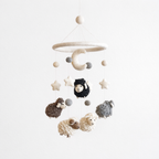 Mobile - Felt Baby Gray Sheep hanging with soft felt sheep in neutral tones, stars, and a crescent moon, creating a cozy and stylish nursery accessory for modern families.