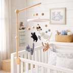 Mobile - Felt Baby - Cat hanging above a white crib in a cozy nursery, featuring soft neutral colors, wooden arm, and wool felt cat figures for soothing sensory play.