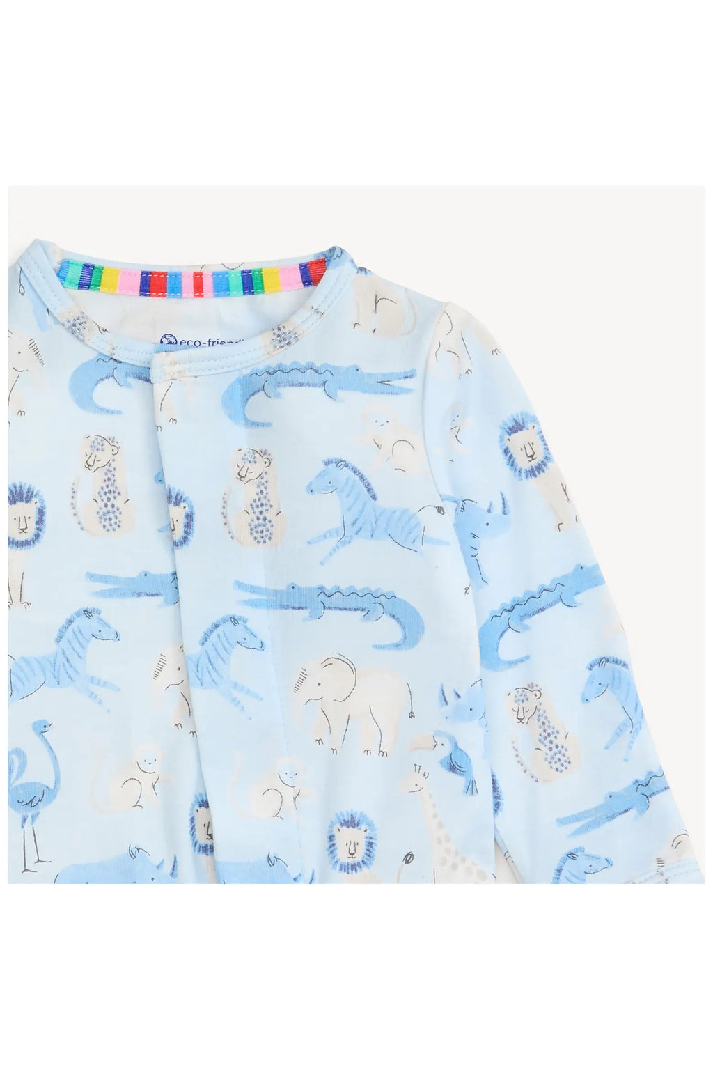 A close-up of a baby long-sleeve pajamas in light blue with an all-over safari animal print, including zebras, lions, and crocodiles. The inner collar features a colorful striped trim.