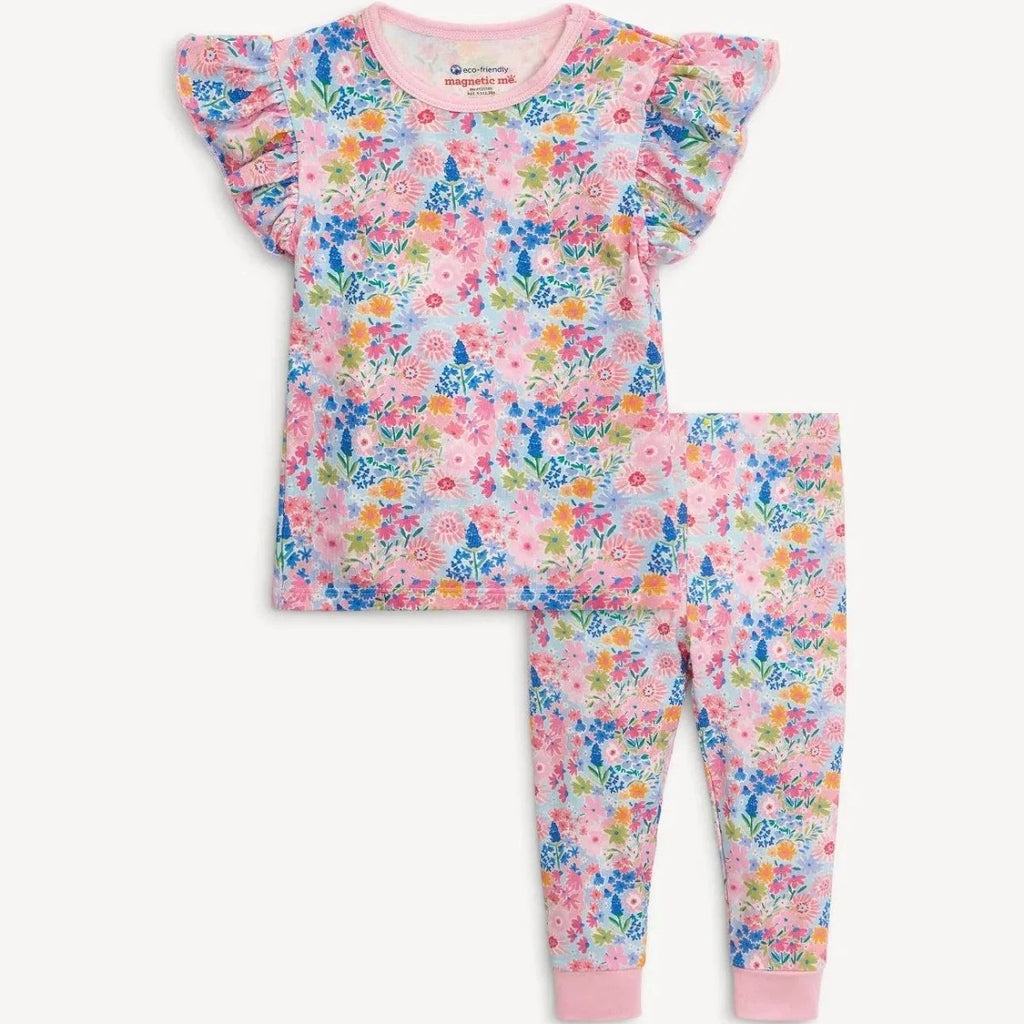 A two-piece children's pajama set featuring a short-sleeve top and matching leggings with a colorful floral print on a light pink base, displayed flat against a light off-white background.