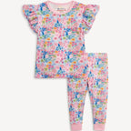 A two-piece children's pajama set featuring a short-sleeve top and matching leggings with a colorful floral print on a light pink base, displayed flat against a light off-white background.