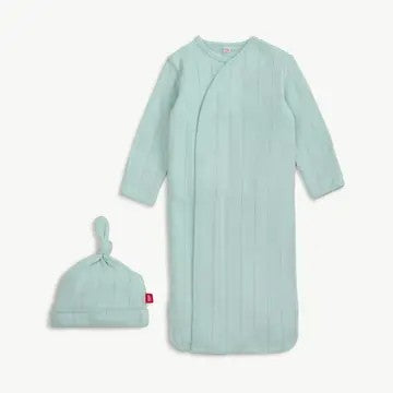 A baby sleep sack and matching knotted beanie set in a light mint green ribbed fabric, displayed on a clean off-white background.
