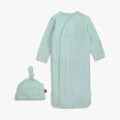 A baby sleep sack and matching knotted beanie set in a light mint green ribbed fabric, displayed on a clean off-white background.