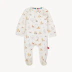 A baby long-sleeve footed sleeper in white with Winnie the Pooh print, shown flat on a light gray background.