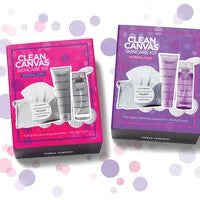 Two Clean Canvas Skincare Kit (Limited-Edition) boxes displayed with skincare products and soft pastel polka dot background, reflecting cozy baby essentials and mom life essentials.