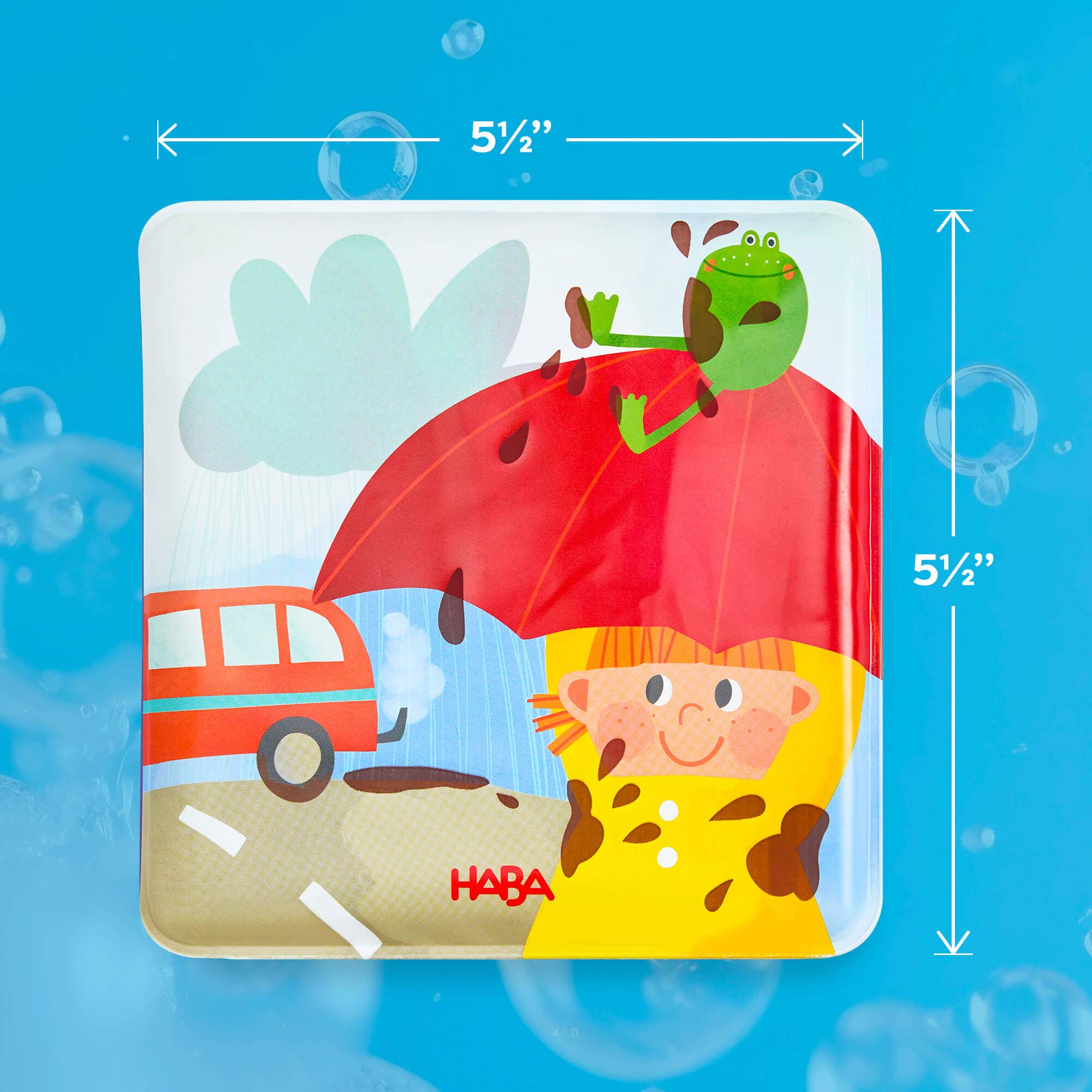 Magic Muddy Day Color Changing Bath Book showing a colorful waterproof page with a child in a yellow raincoat, red umbrella, and a green frog, designed for playful bath time learning.