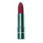 A single lipstick tube centered on a plain white background. The lipstick bullet is a deep berry red, and the metallic case is a teal-green color with the brand name 'MERLE NORMAN' printed in white near the bottom.