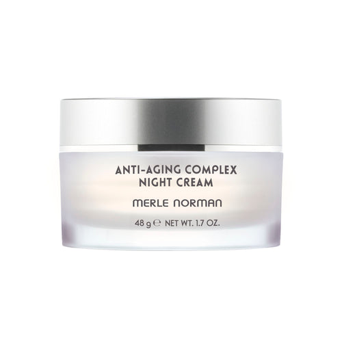 Anti-Aging Complex Night Cream in a frosted jar with silver lid, designed for mom life essentials and skincare routines promoting youthful skin.