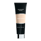 Tube of Aqua Balance Makeup in neutral beige shade, featuring sleek black and silver packaging, ideal for modern mom life essentials and stylish kids clothing boutiques.