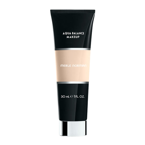 Tube of Aqua Balance Makeup in neutral beige shade, featuring sleek black and silver packaging, ideal for modern mom life essentials and stylish kids clothing boutiques.