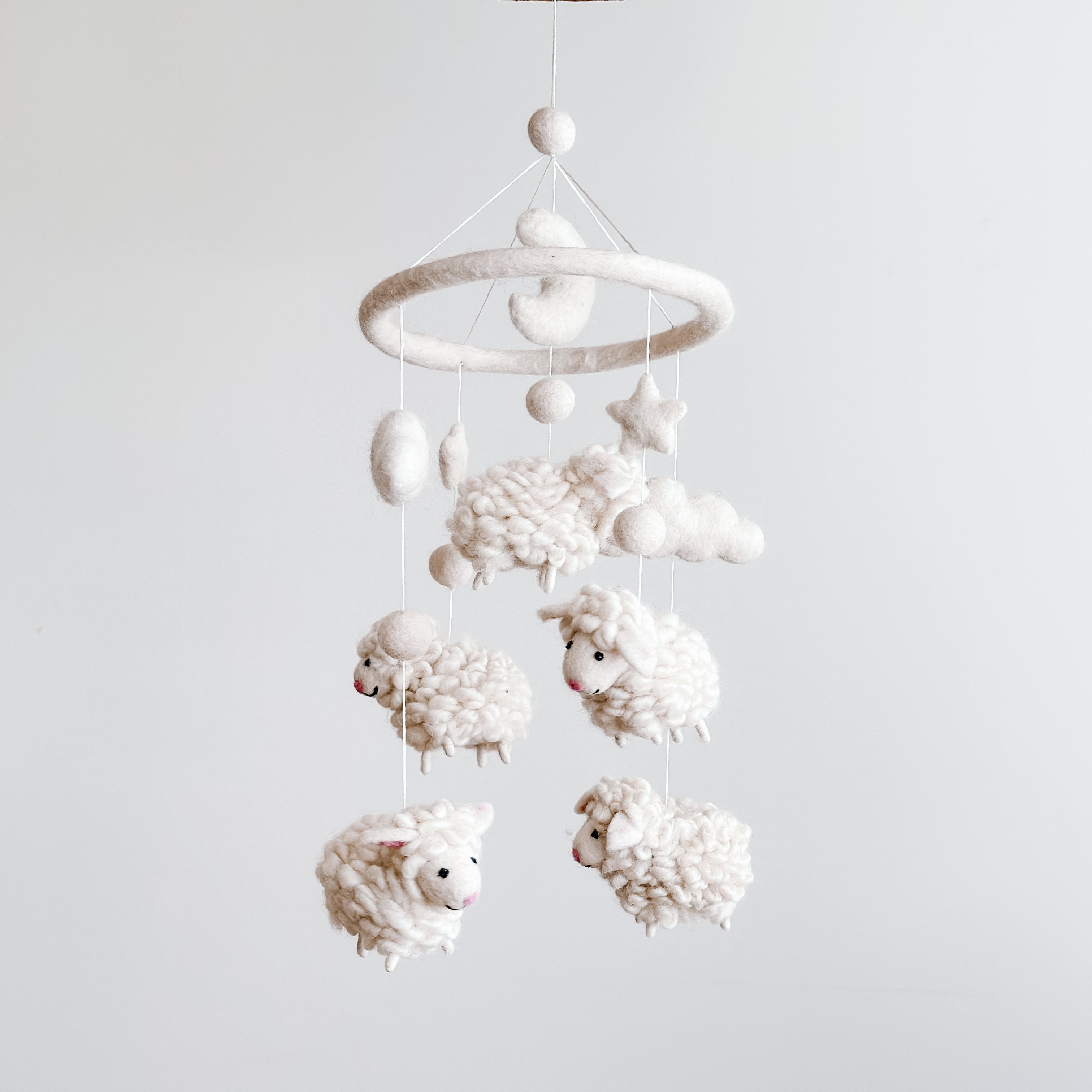 Mobile - Felt Baby - Counting Sheep featuring soft felt sheep, stars, moon, and clouds in neutral tones, designed as a cozy baby accessory for soothing nursery decor.