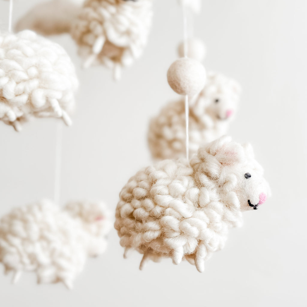 Soft, neutral-toned Mobile - Felt Baby - Counting Sheep hanging decoration featuring cozy, handcrafted felt sheep for a stylish baby accessory in a curated children’s boutique.