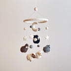 Mobile - Felt Baby - Counting Sheep hanging nursery decor featuring soft felt sheep, stars, and a crescent moon in neutral tones, perfect for cozy baby accessories and mom life essentials.