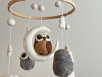 Mobile - Felt Baby - Owl showing a soft felt owl perched on a crescent moon, surrounded by neutral-hued felt balls and shapes, perfect for a stylish children's boutique nursery.
