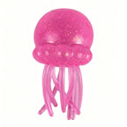Pink jellyfish toy on a white background