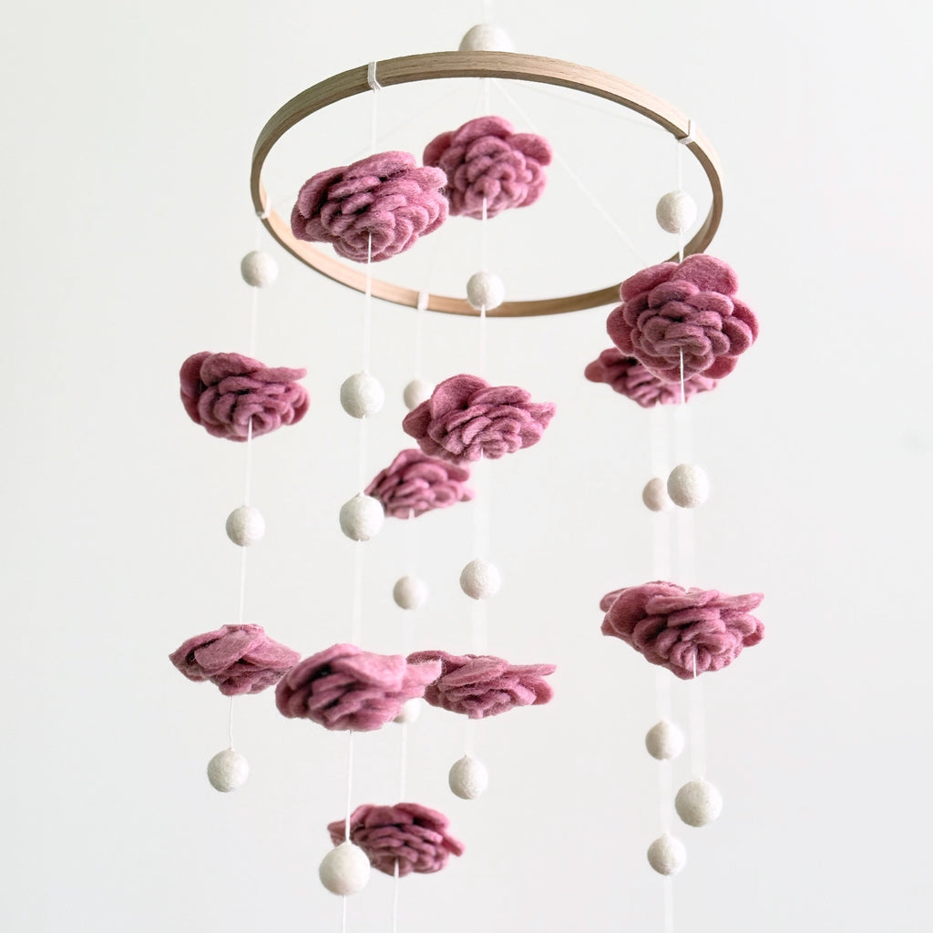 Mobile - Felt Baby - Blush Rose Flower hanging nursery decor featuring soft blush rose felt flowers and cream felt balls, perfect for a modern baby boutique or cozy baby essentials.
